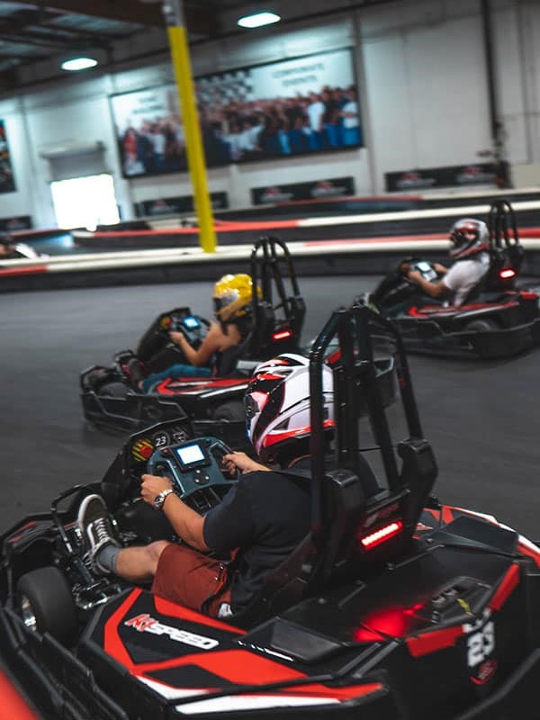 people driving a go cart