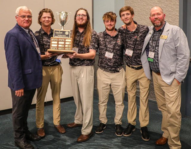 HGTC Students and Professors celebrate Turf Bowl Championship Win.