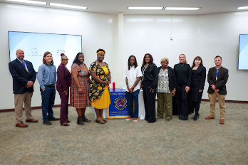 Peter Yocum (far left), HGTC Associate Professor-Business, and Kevin Miller (far right), HGTC Associate Professor-Economics, host inaugural induction ceremony of the HGTC Alpha Beta Gamma Honor Society.