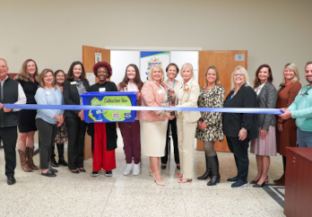 HGTC leaders, students, and community partners celebrate the ribbon cutting for the expanded Pantry on the Grand Strand Campus.