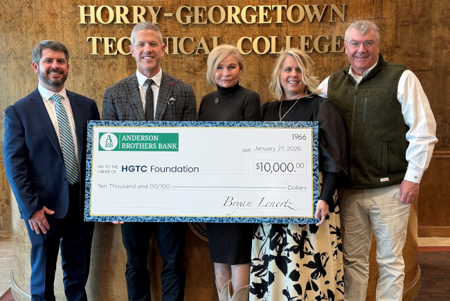 HGTC Foundation receives a $10,000 check from Anderson Brothers Bank, the presenting sponsor of Southwest Splendor.