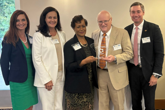 Horry-Georgetown Technical College leaders and commissioners celebrate recent honors presented by the South Carolina Association of Technical College Commissioners.