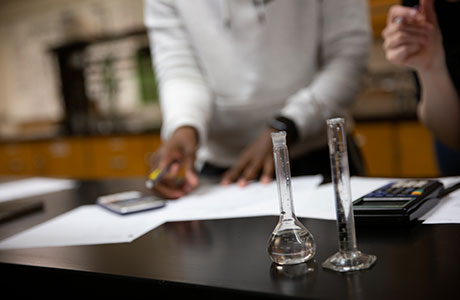  students work with a lab test