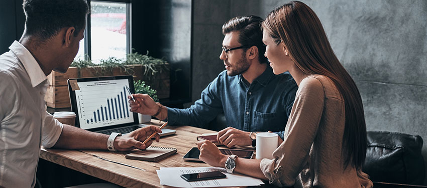 a group of students discuss business